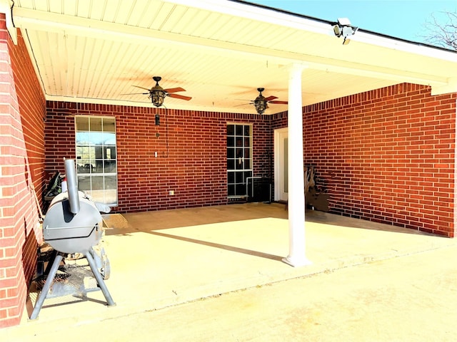 view of patio / terrace featuring ceiling fan