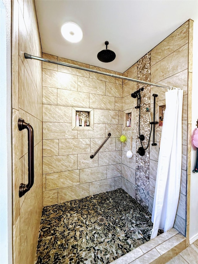 bathroom with curtained shower