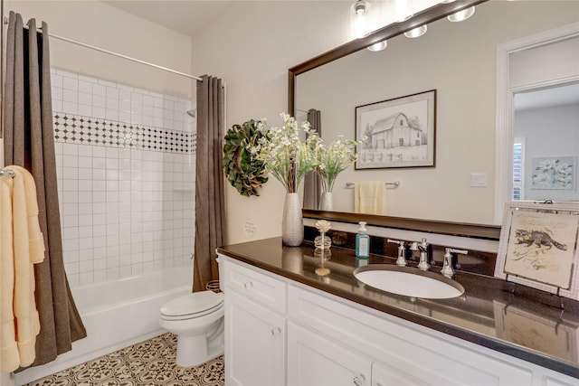 full bathroom with vanity, tile patterned flooring, toilet, and shower / bath combo