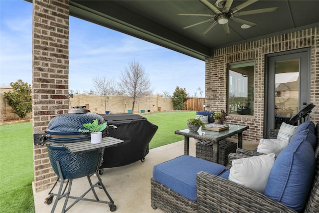 view of patio with ceiling fan, grilling area, and an outdoor hangout area