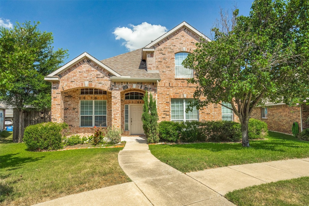 view of property with a front yard