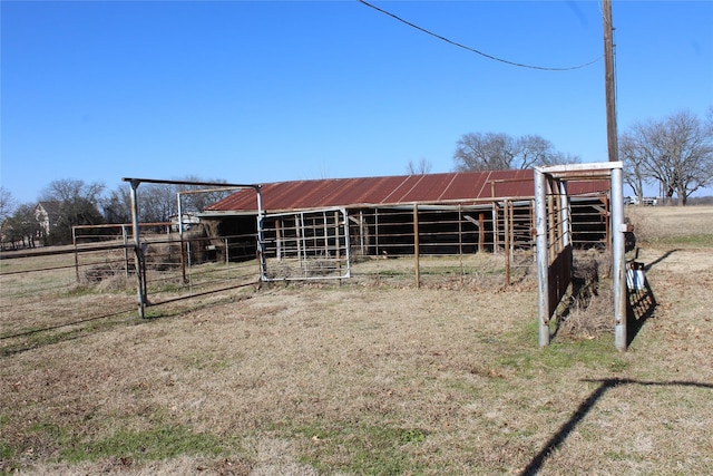 view of outdoor structure featuring a rural view