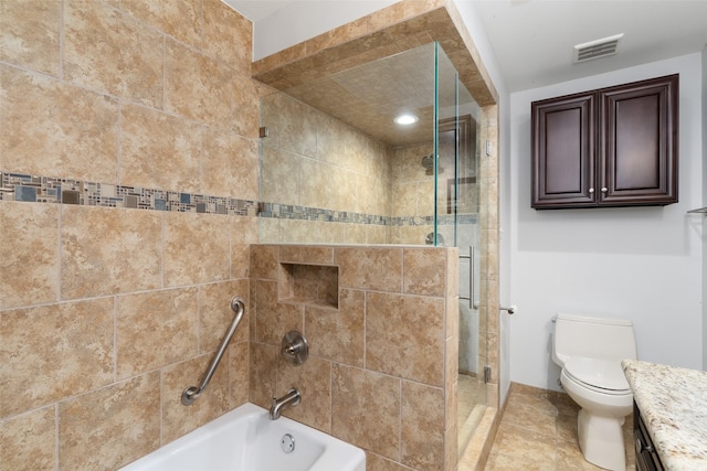 full bathroom featuring tile patterned floors, toilet, vanity, and separate shower and tub