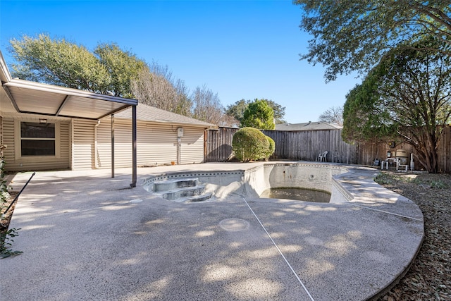 view of patio / terrace featuring an empty pool