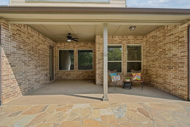 view of patio / terrace featuring ceiling fan