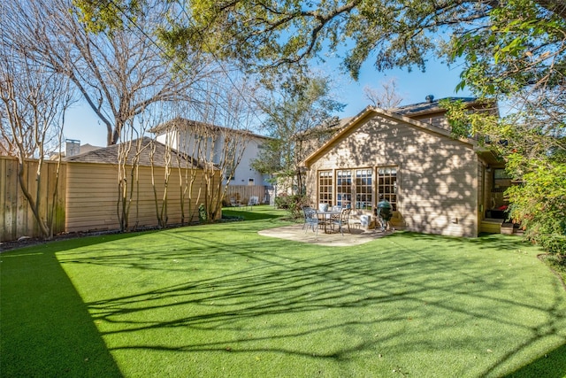 view of yard featuring a patio area and a shed