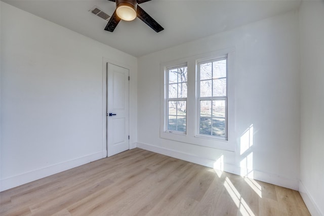 unfurnished room featuring light wood-type flooring and ceiling fan