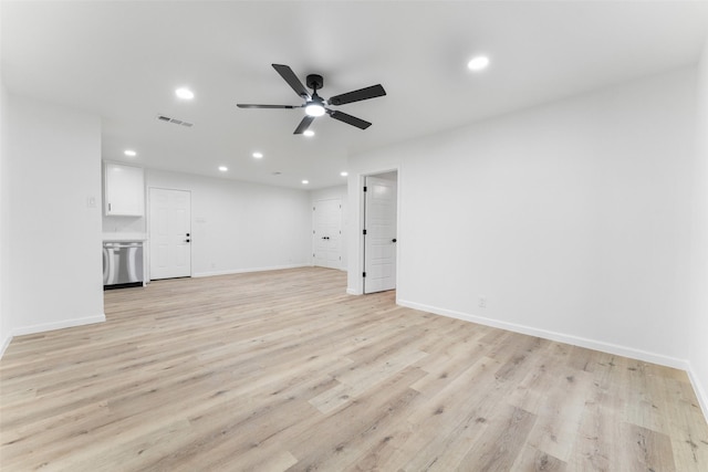 unfurnished living room featuring ceiling fan and light wood-type flooring