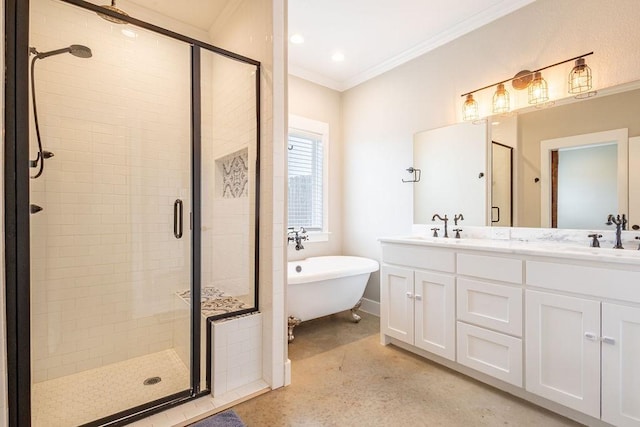 bathroom with vanity, crown molding, and separate shower and tub