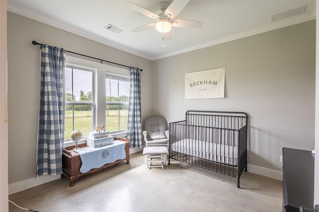 bedroom featuring crown molding, a crib, concrete flooring, and ceiling fan