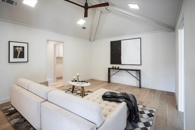 living room featuring lofted ceiling with beams, crown molding, ceiling fan, and light hardwood / wood-style flooring