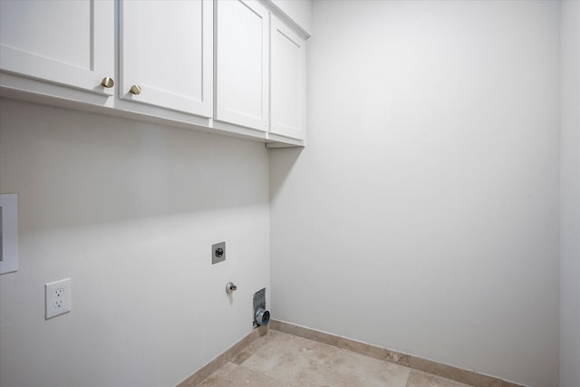 laundry area featuring cabinets and electric dryer hookup