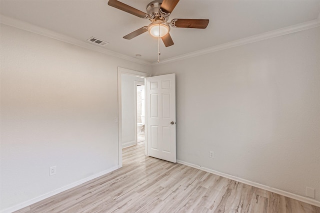 unfurnished room featuring light hardwood / wood-style floors, crown molding, and ceiling fan