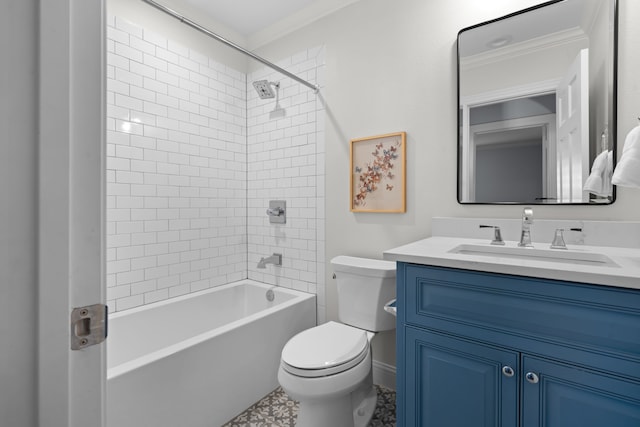 full bathroom with toilet, vanity, ornamental molding, and tiled shower / bath