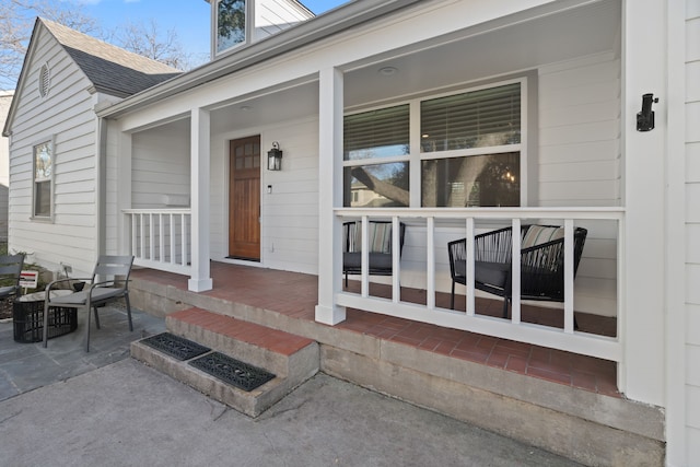 doorway to property featuring a porch