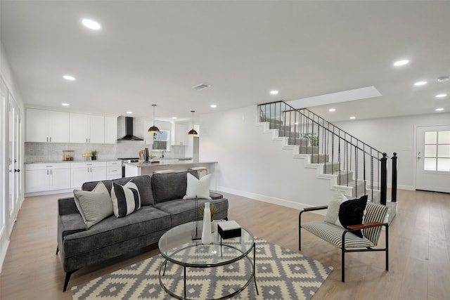 living room featuring light wood-type flooring