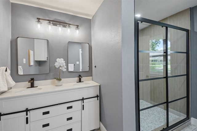 bathroom with an enclosed shower and vanity