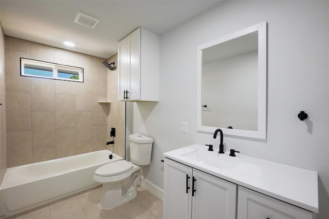 full bathroom with tiled shower / bath combo, toilet, tile patterned flooring, and vanity