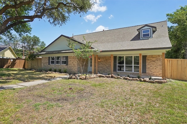 view of front facade with a front lawn