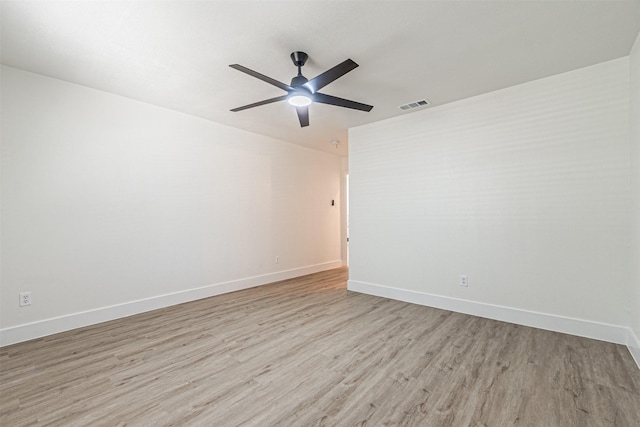 unfurnished room with ceiling fan and light hardwood / wood-style flooring