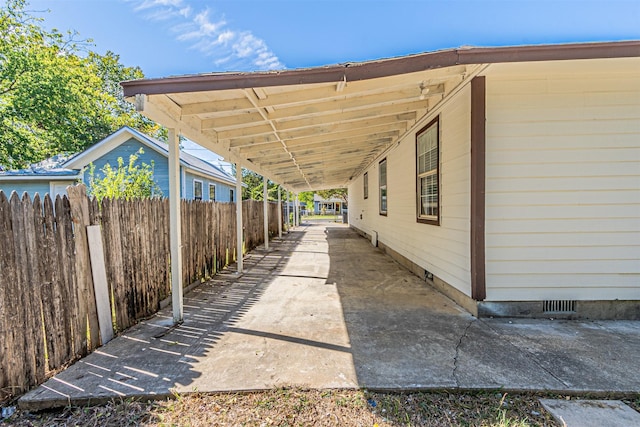 view of patio with a carport