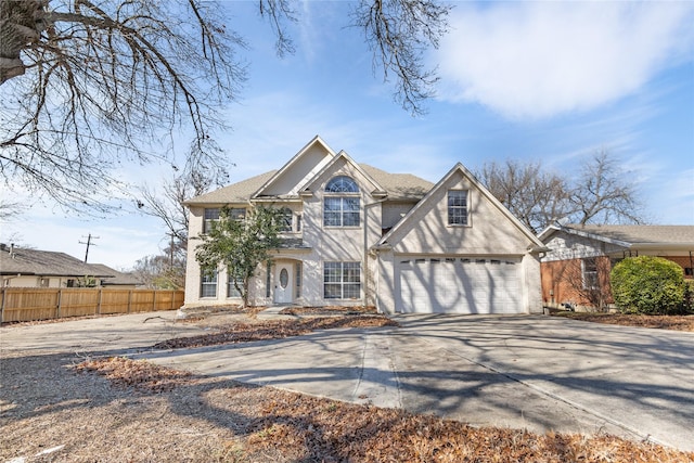 view of front of property with a garage