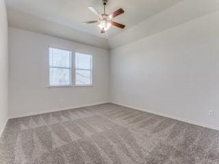 empty room featuring carpet and a ceiling fan