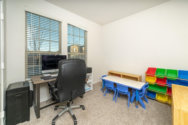 view of carpeted office space