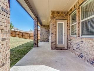 view of patio with fence