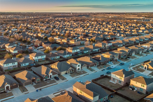 aerial view at dusk with a residential view