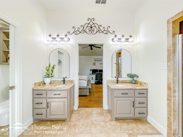 bathroom with vanity and tile patterned flooring