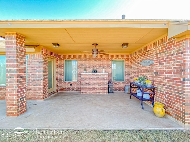 view of patio featuring ceiling fan