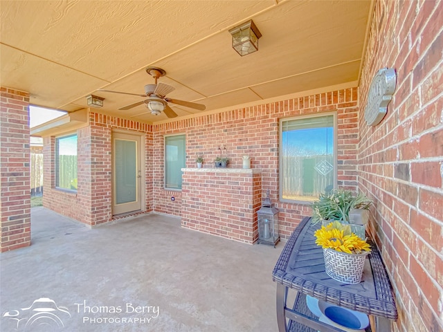 view of patio / terrace featuring ceiling fan