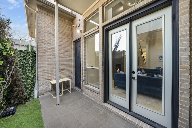 entrance to property with a patio area