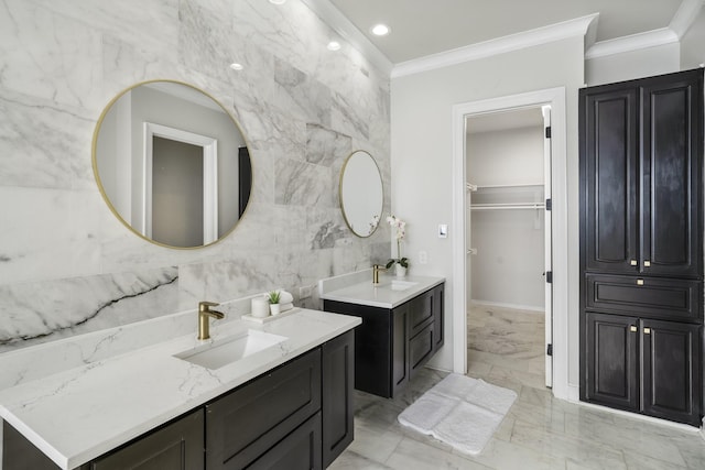 bathroom featuring ornamental molding, tile walls, and vanity