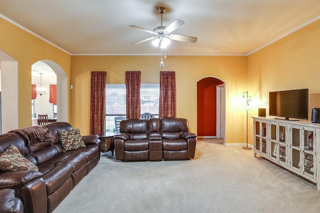 living room featuring light carpet, crown molding, and ceiling fan