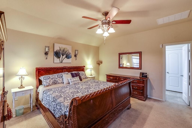 carpeted bedroom featuring ceiling fan and lofted ceiling