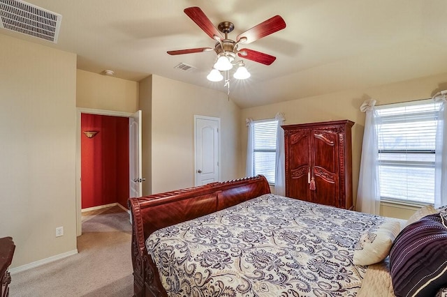 bedroom featuring light colored carpet and ceiling fan