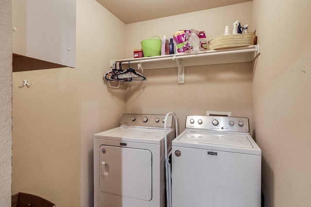 washroom featuring independent washer and dryer