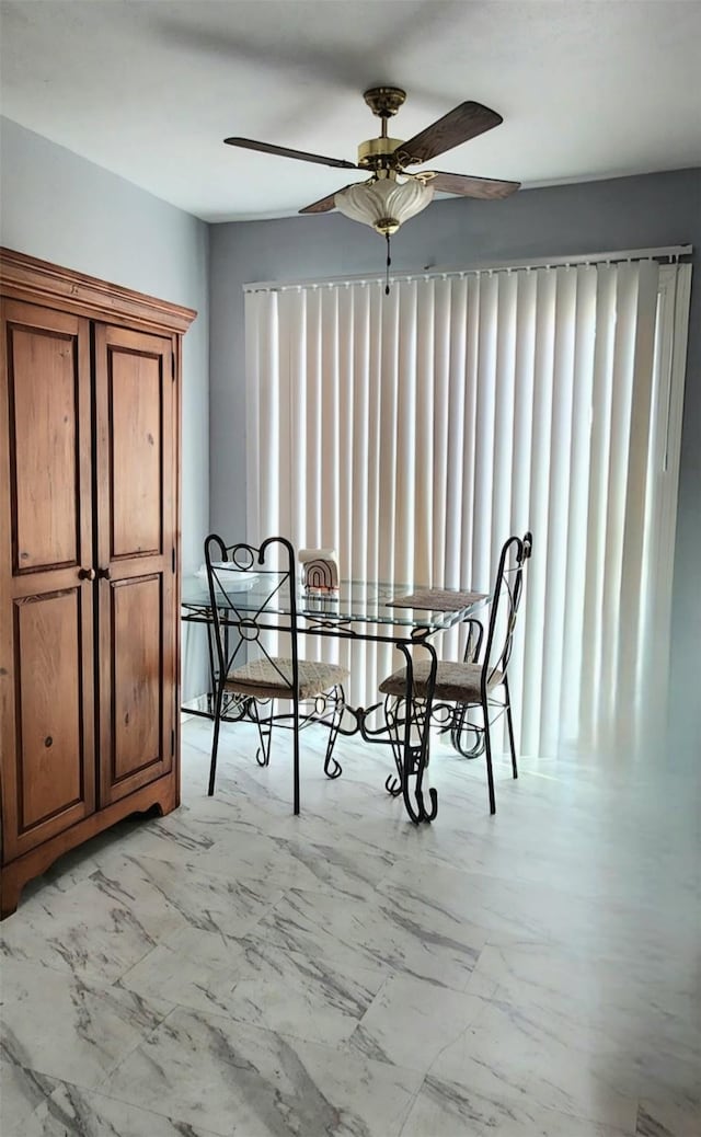 unfurnished dining area with ceiling fan