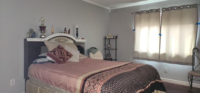 bedroom with crown molding and wood-type flooring