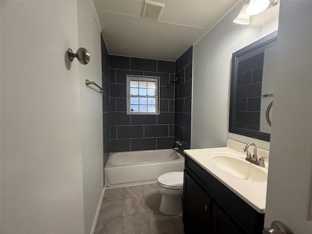 full bathroom with vanity, tiled shower / bath combo, and toilet