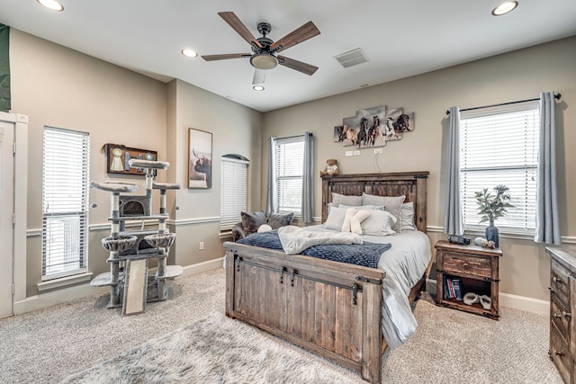 carpeted bedroom with baseboards, a ceiling fan, visible vents, and recessed lighting