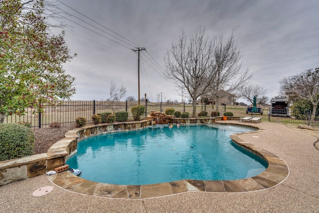 view of pool with a patio area, a fenced backyard, and a fenced in pool