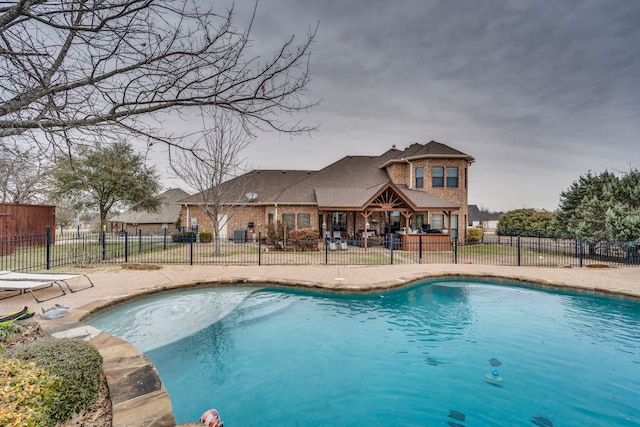 view of pool with fence, a fenced in pool, and a patio