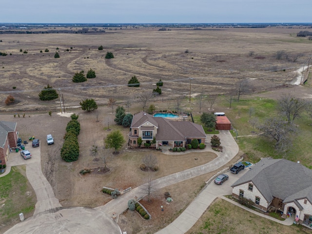 birds eye view of property featuring a rural view