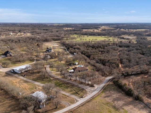 birds eye view of property featuring a rural view