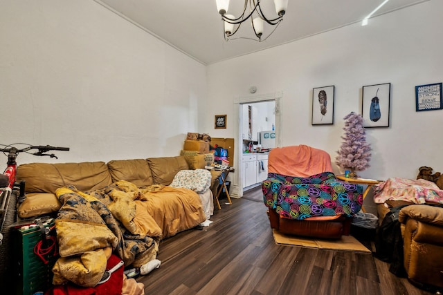 living room featuring dark wood-type flooring and a notable chandelier