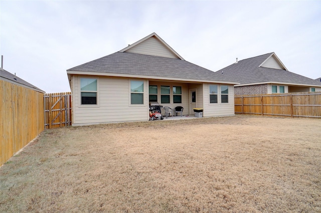 rear view of property with a patio area