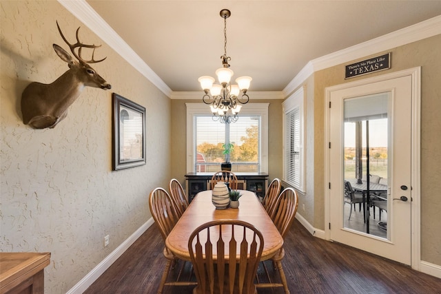 dining space featuring an inviting chandelier, ornamental molding, dark wood-type flooring, and a textured wall